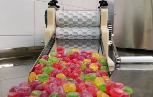 What Is a Candy Drop Roller Machine?