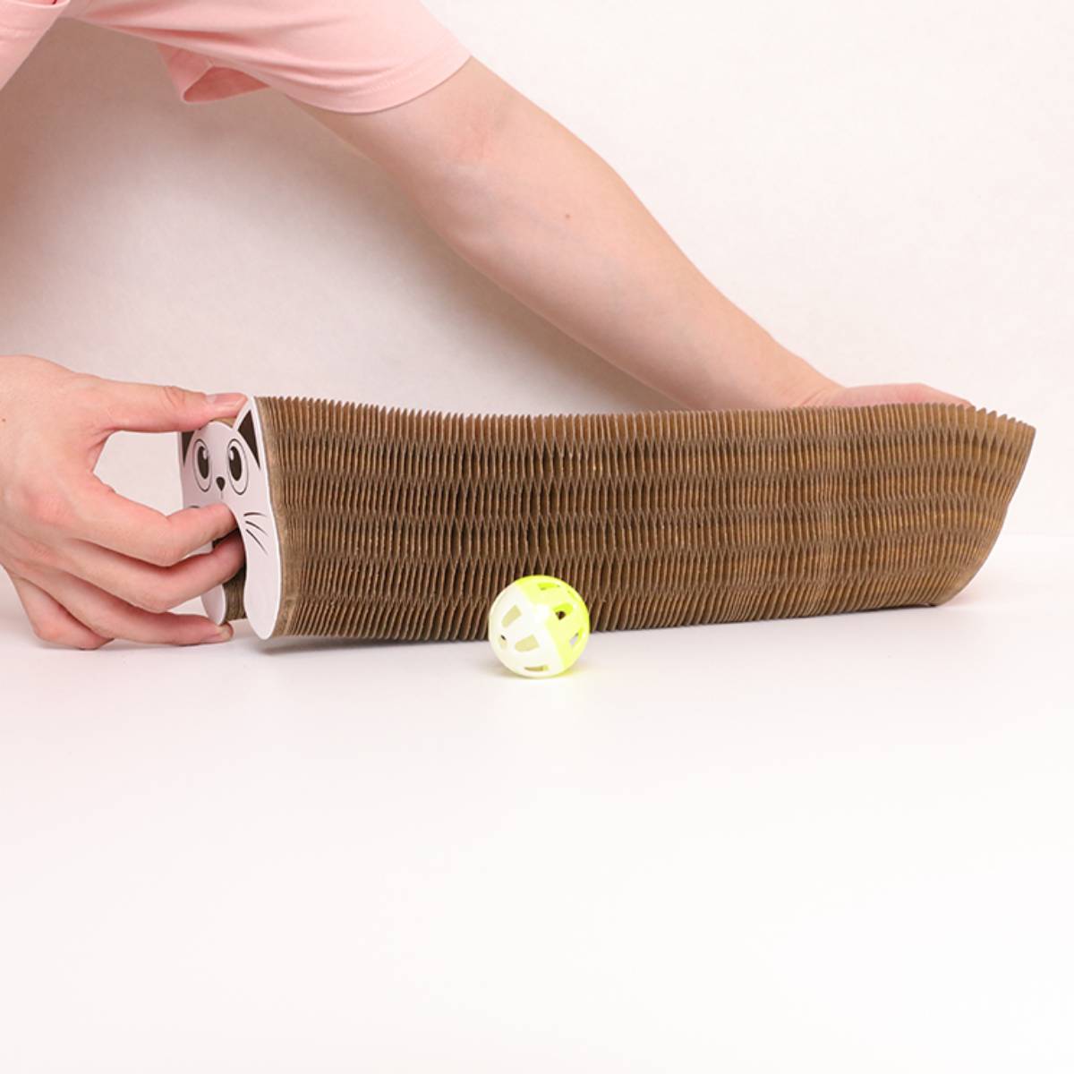 Cat head shaped scratching board with spherical toy
